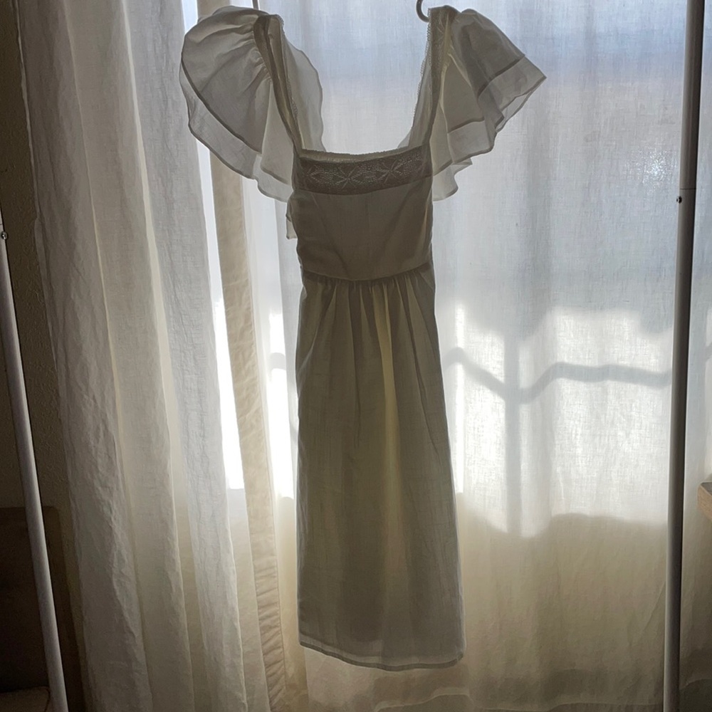 White dress with Embroidery by Wild Fable.